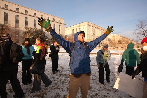 Power Shift 2009, Washington DC. Students from across the country assemble to march on and protest outside the coal fired power plant that supplied Capitol Hill with power. Activists were led by writer Wendell Berry, NASA scientist Jim Hansen, Terry Tempest Williams, writer/activist Bill McKibbben, actress Daryl Hannah and others in an act of civil disobedience, the 1st large scale action. Kent Boardman from Salt Lake City celebrates after the end of the protest which shut down the coal fired power plant. : Tim DeChristopher : Sallie Dean Shatz