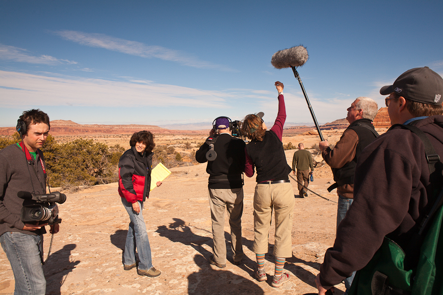 Beth and George Gage and their film crew preparing to interview Tim DeChristopher who is, for the first time standing on one of the parcels of land that he won in an act of civil disobedience in the December 19, 2008 BLM oil and gas lease auction. These parcels were later pulled from being auctionable by the Obama administration. : Tim DeChristopher : Sallie Dean Shatz
