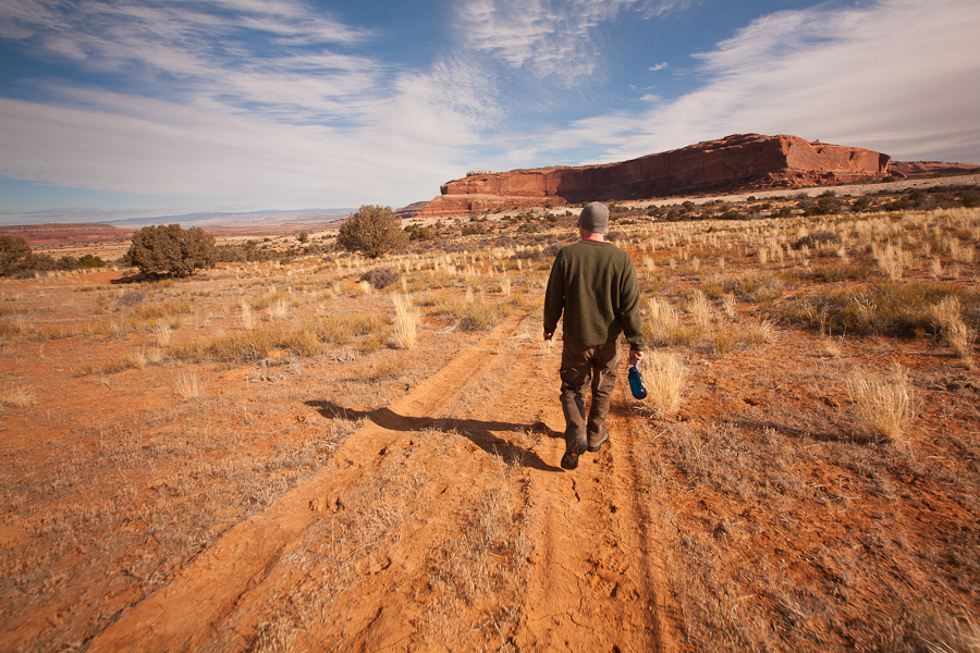 Tim DeChristopher walking towards one of the parcels that he won in his act of civil disobedience at the December 19, 2008 BLM oil and gas auction. This is the first time he would stand on one of the parcels that he won. These parcels were later pulled from being auctionable by the Obama administration. : Tim DeChristopher : Sallie Dean Shatz