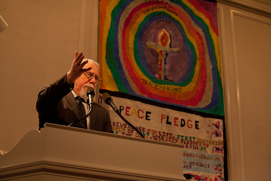 Revered Tom Goldsmith introducing Tim DeChristopher at the First Unitarian Church of Salt Lake City, a month after his act of civil disobedience at the BLM oil and gas lease auction December 19th, 2008. The forum's title "Is Civil Disobedience A Moral Imperative In This Time? Speakers were DeChristopher, Former Salt Lake City Mayoer Rocky Anderson, activist Michael Milke, and University of Utah's scientists. : Tim DeChristopher : Sallie Dean Shatz