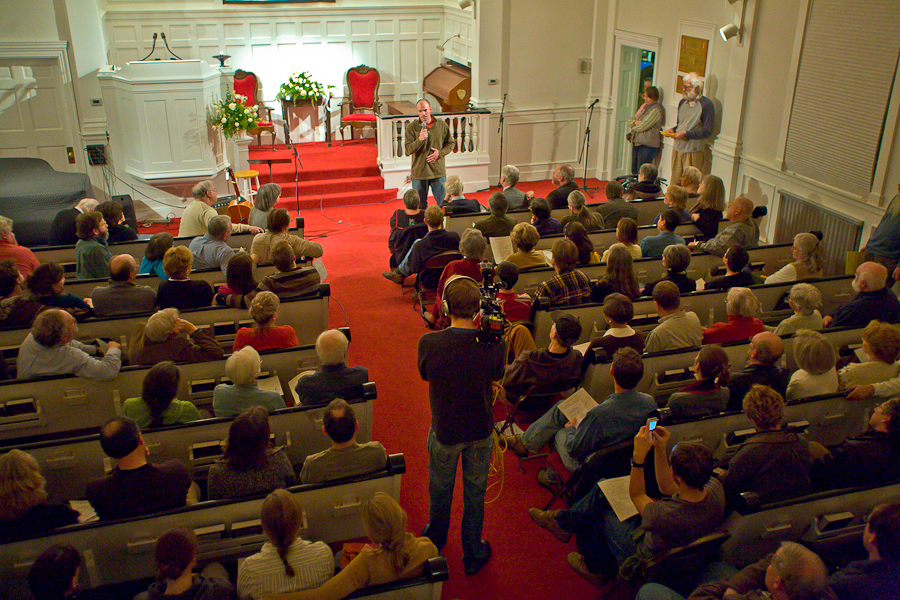 Tim DeChristopher speaking to concerned citizens at the First Unitarian Church of Salt Lake City, a month after his act of civil disobedience at the BLM oil and gas lease auction December 19th, 2008. The forum's title "Is Civil Disobedience A Moral Imperative In This Time? Speakers were DeChristopher, Former Salt Lake City Mayoer Rocky Anderson, activist Michael Milke, and University of Utah's scientists. : Tim DeChristopher : Sallie Dean Shatz